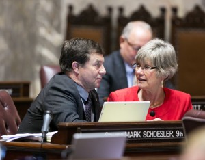 Senate Majority Leader Mark Schoesler, R-Ritzville, confers with Caucus Leader Linda Evans Parlette, R-Wenatchee.